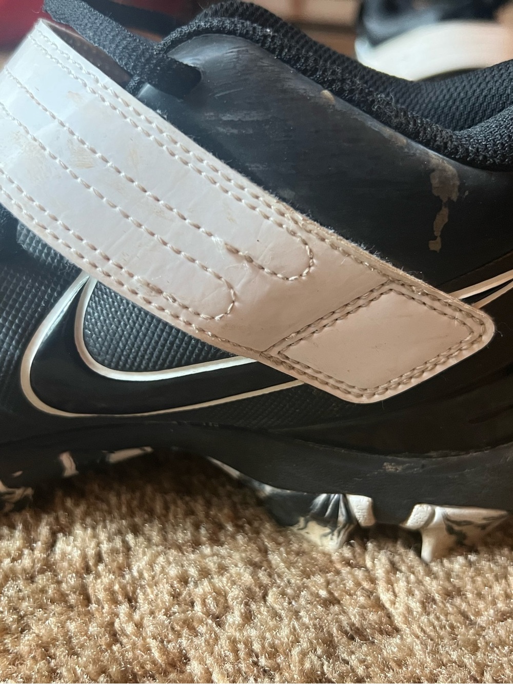 Nike Black Athletic Shoes with White Swoosh